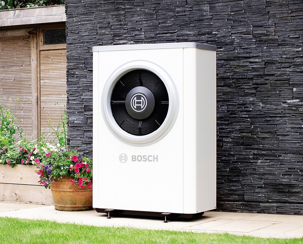 Bosch air source heat pump system installed outside a residential property in South Devon
